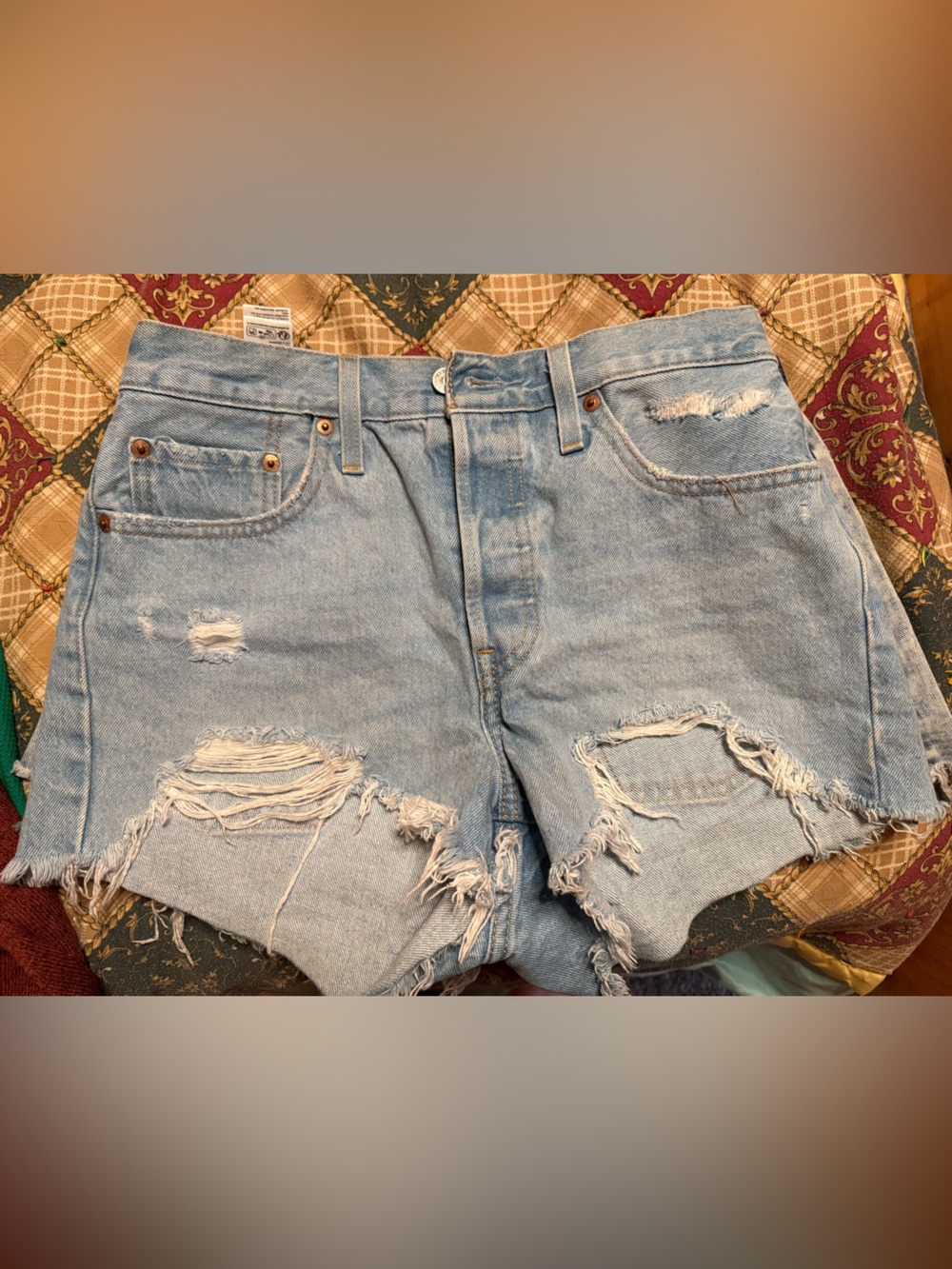 High-Rise Light Blue Distressed Denim Shorts